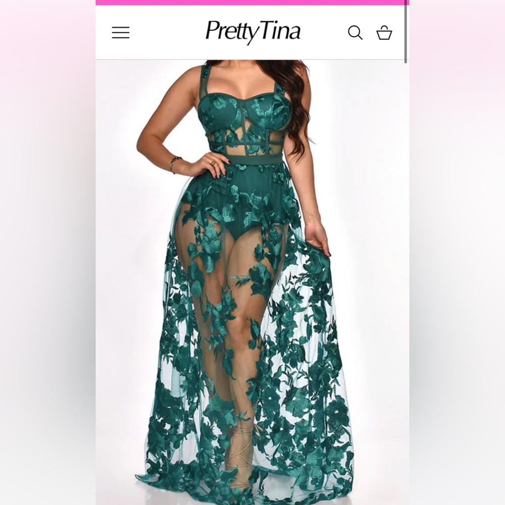 Green dress/romper. Free if you can fix the zipper.